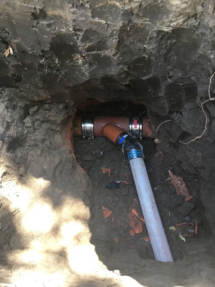 underground sewer drain rerouted for residential bathroom addition using PVC pipe