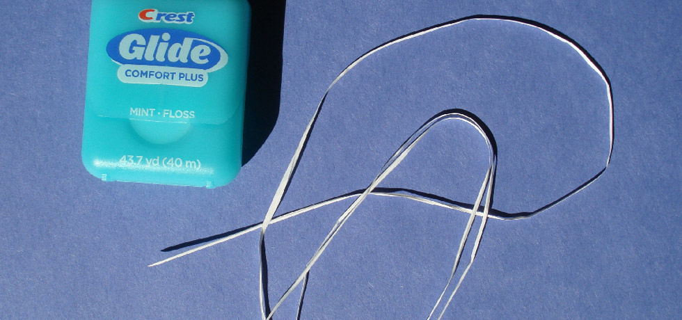 can you flush dental floss down the toilet?
